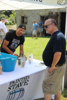 Ron (L) from Painted Stave Distillery whips up a Lemon Drop for tDoB co-founder Chuck
