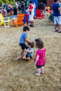 Kids playing in the sand.
